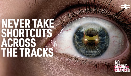 Close-up of an eye with a digital overlay of a train reflected in the iris and bold white text on the left.