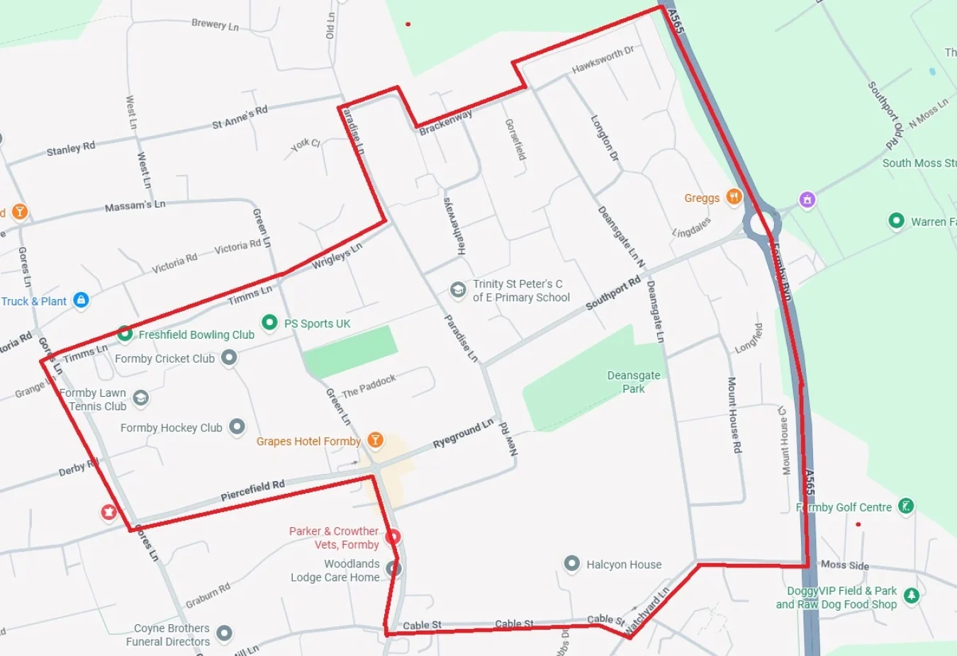 Map view showing a red outlined boundary over streets and parks in Formby area.