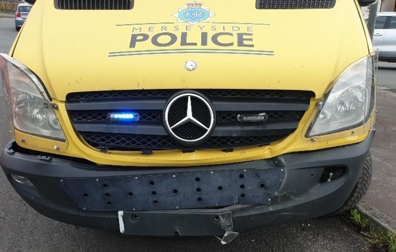 police damage van