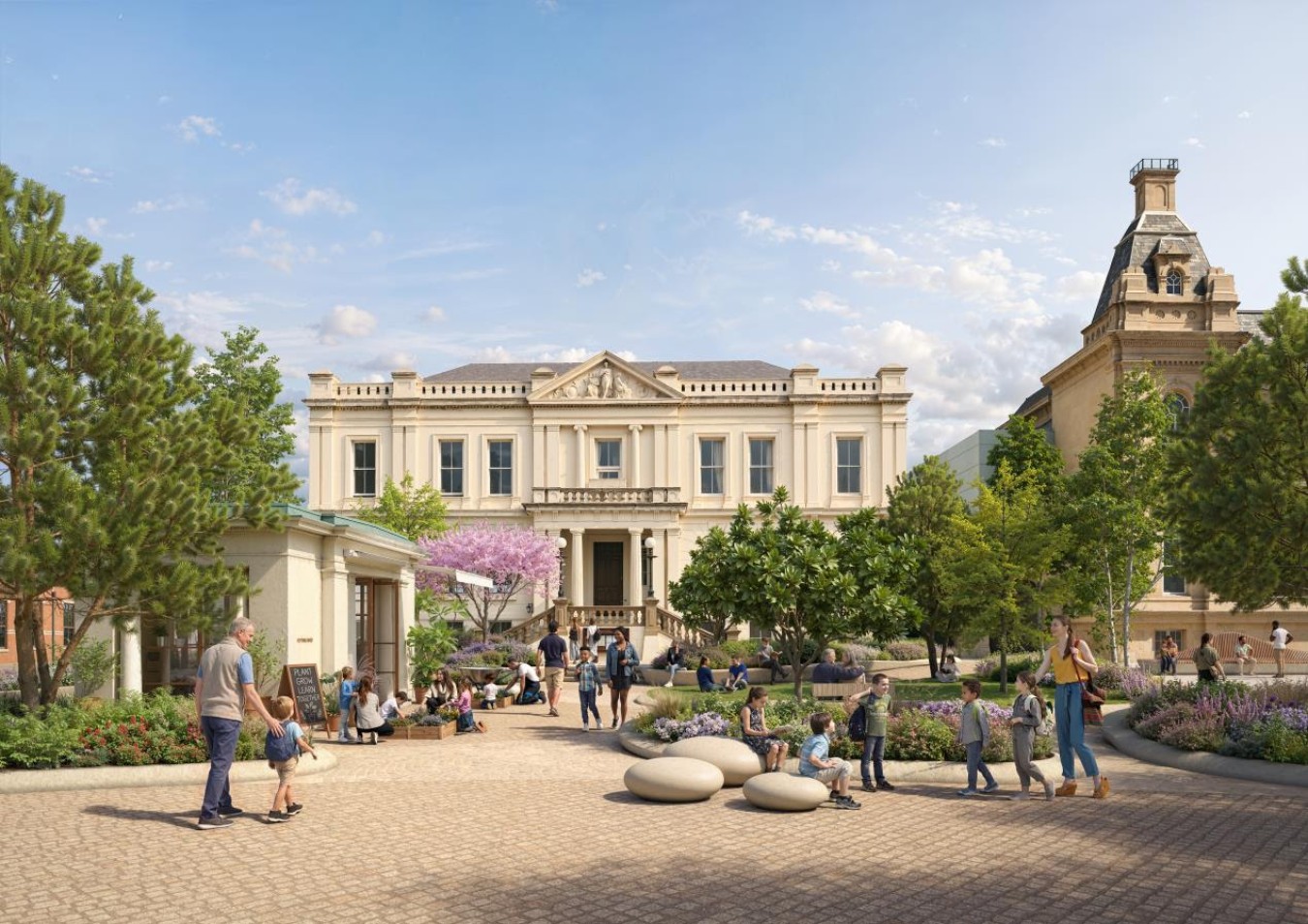 Sunlit historic town square with a grand central building, people relaxing and walking among trees and flowerbeds.
