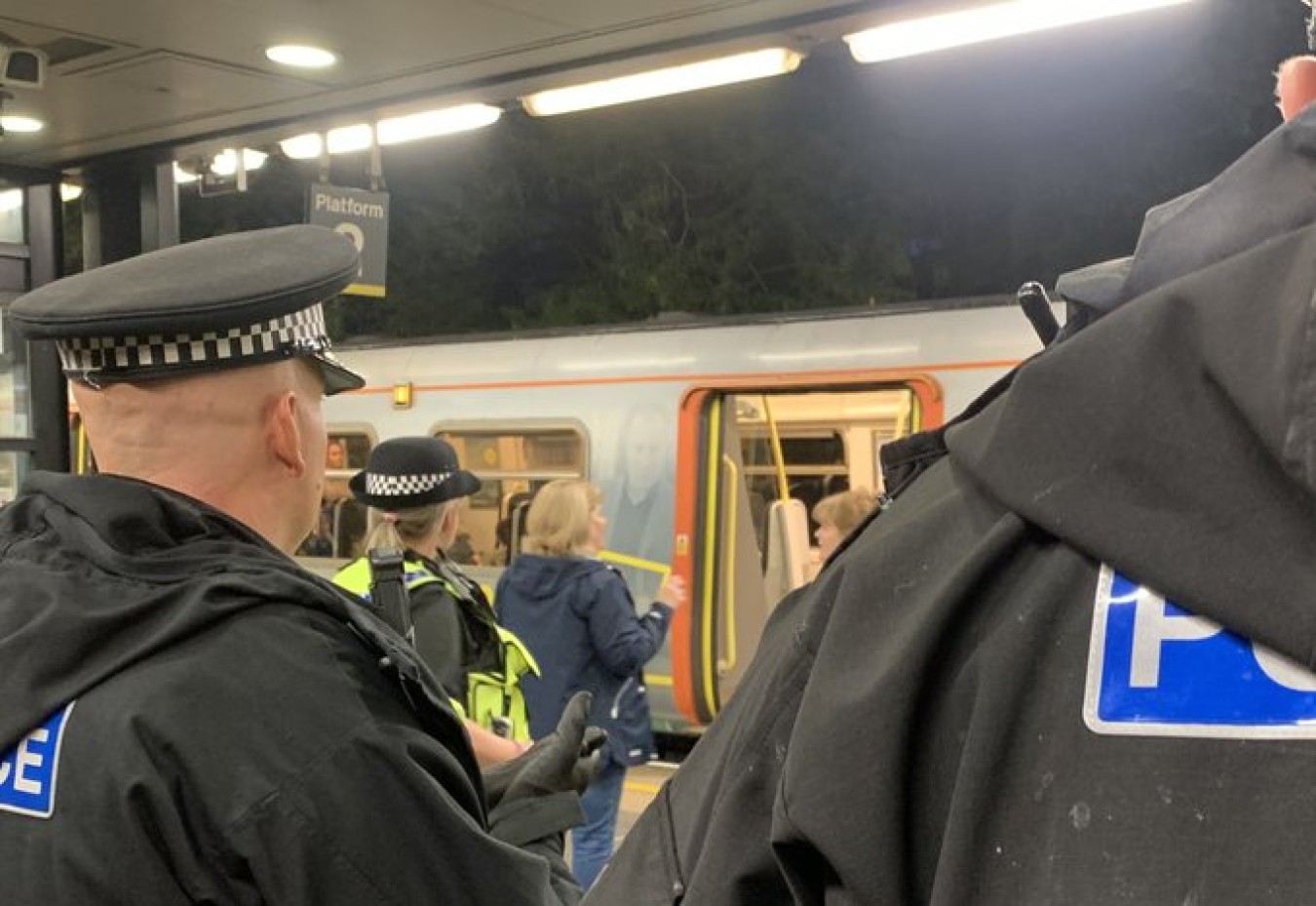 police officers at train station