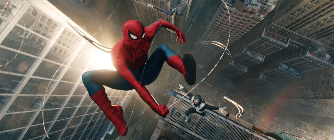 Spider-Man swings between tall city buildings at dusk with a companion on a ledge