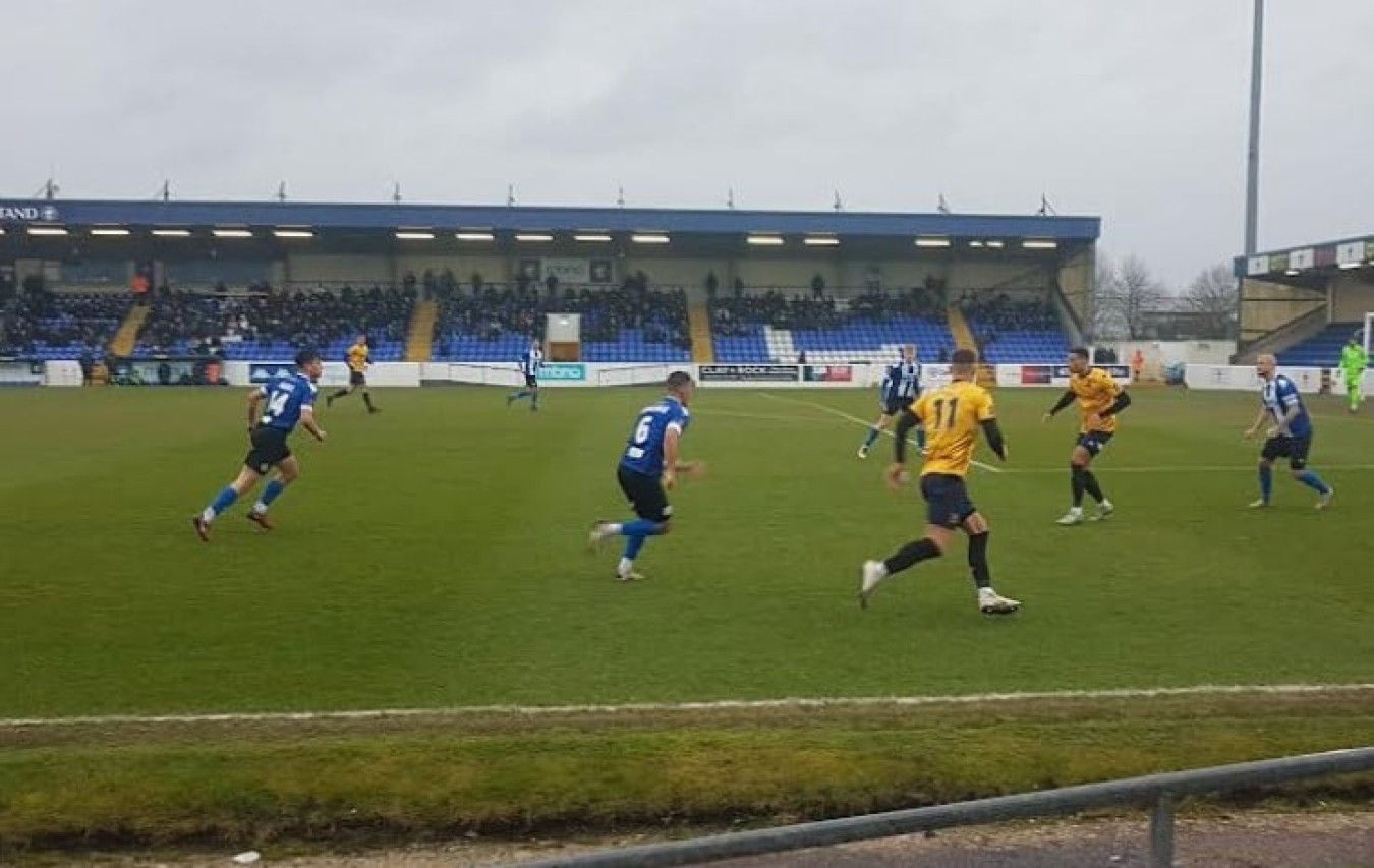 a group of men playing football