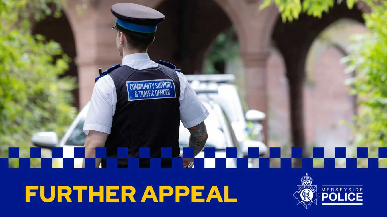 Community support and traffic officer in uniform facing away outdoors