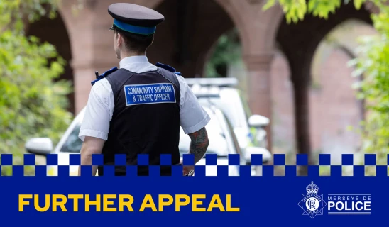 Community support and traffic officer in uniform facing away outdoors