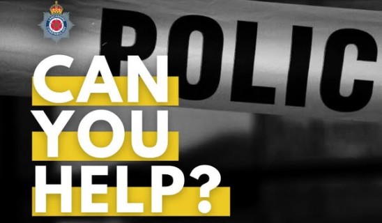 Appeal poster with 'CAN YOU HELP?' text over a police backdrop and small police crest in corner.