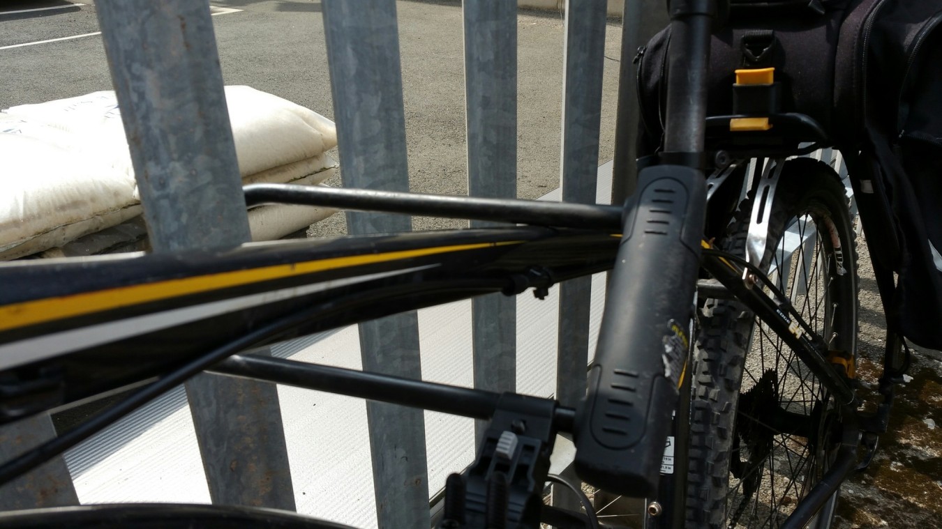 bike locked to a fence